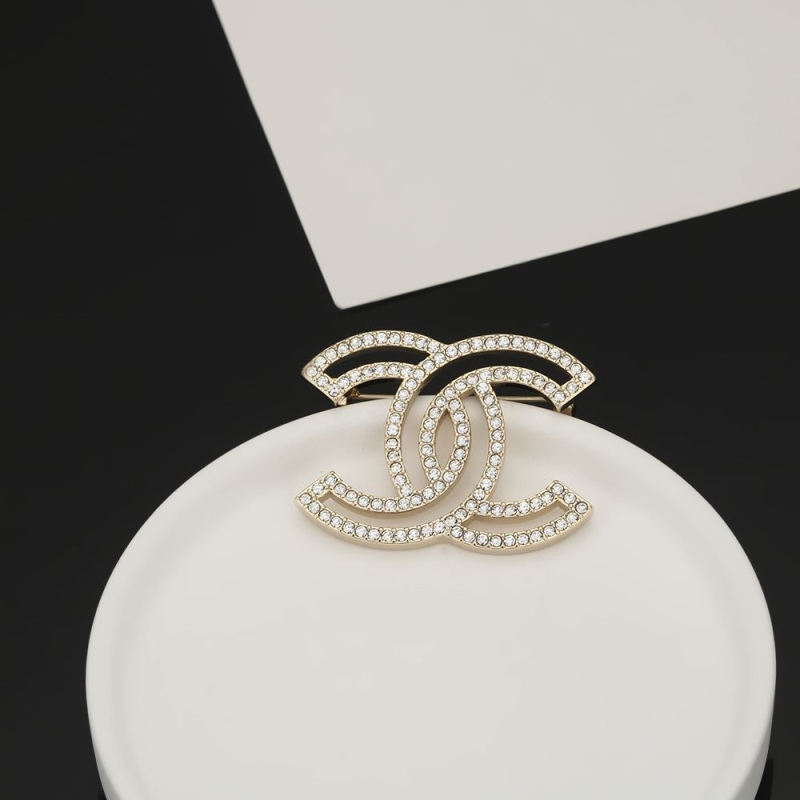 Ch**el brooches